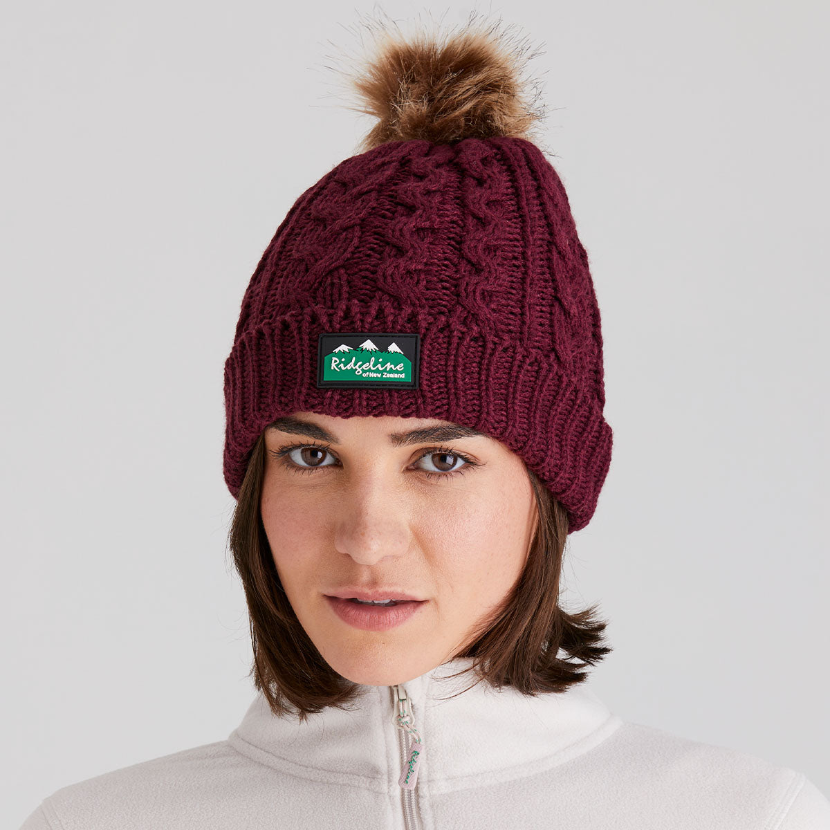 Ridgeline Nordic Fleck Bobble Hat #colour_winter-berry